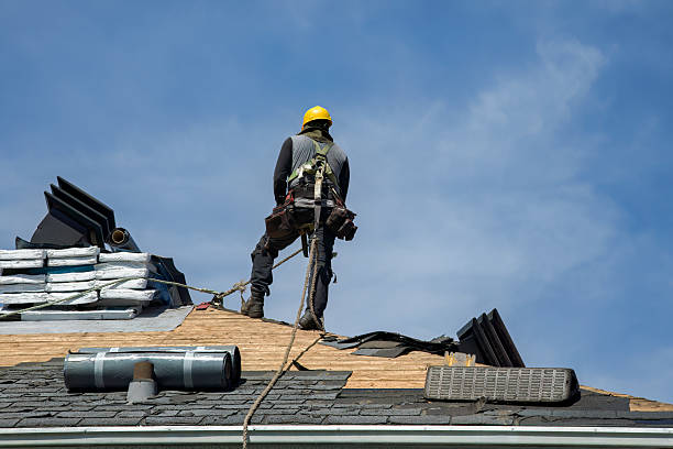 Professional Storm Damage Roof Repair technician working in Strasburg, CO